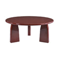 Table basse ovale en rouge élégant et moderne.