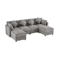 Canapé d'angle en tissu gris avec coussins décoratifs inclus